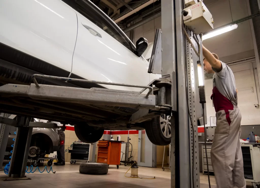 Car Garage Lift - Prairie Land Garages - Chicago Garage builders